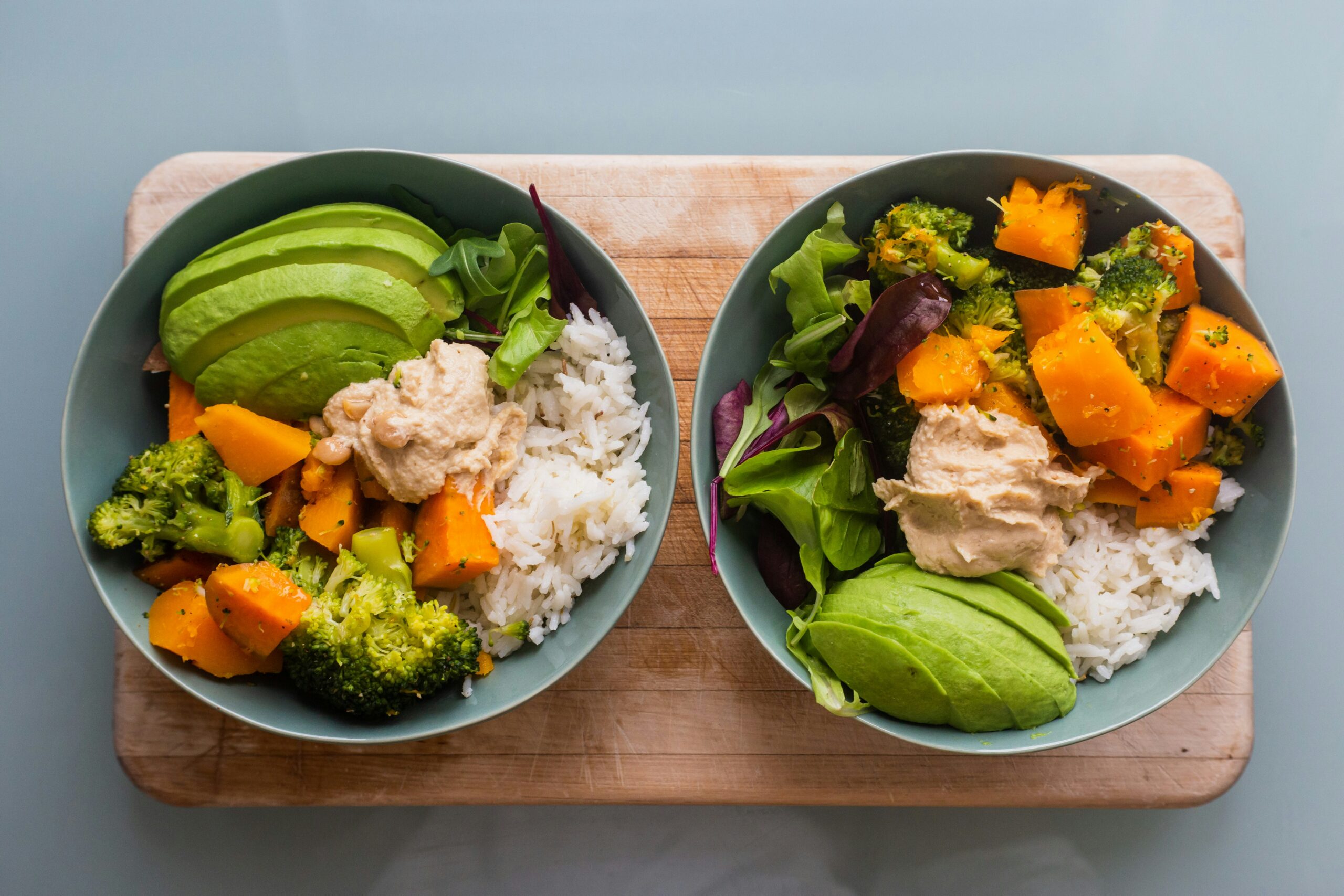 power bowl with rice, avocado, sweet potato, greens, and broccoli